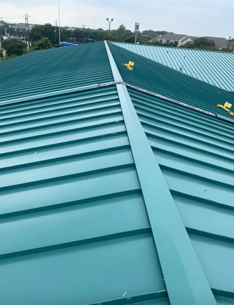 Green commercial metal roof ridge and valley for Metal Roof Repair in Kinross